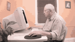 Old Man Using A Computer