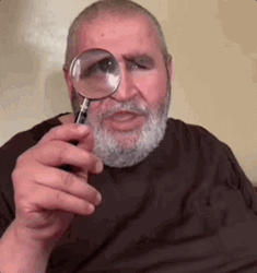 Old Man With Magnifying Glass GIF