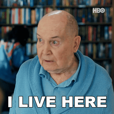 Older Man In Blue Sweater Says I Live Here GIF