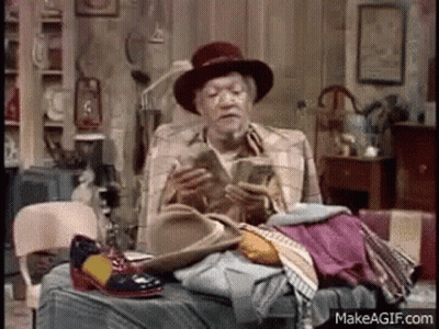 Older Man Sitting On Bed Reading GIF