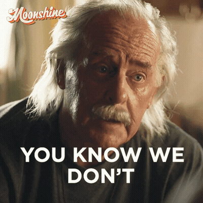 Older Man Talking On Phone With Moonshine GIF