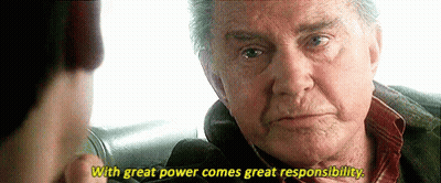 Older Man Telling Younger Man With Great Power Comes Great Responsibility GIF