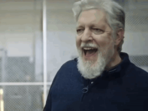 Older Man With Beard Laughing