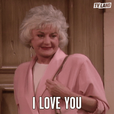 Older Woman In Pink Jacket Says I Love You GIF