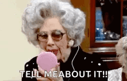 Older Woman Looking In Mirror Saying Tell Me About It GIF