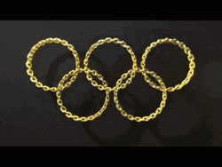 Olympic Rings On Gold GIF