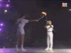 Olympic Torch Lit With Arrow GIF
