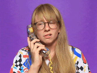 On Hold Woman Shaking Her Head GIF