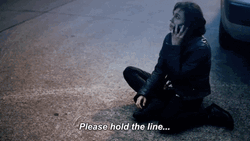 On Hold Woman Sitting On The Road GIF