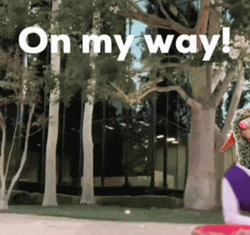 On My Way Sign In Front Of Tree GIF