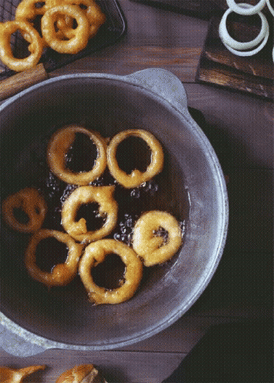 Onion Rings Cooking In Skillet GIF