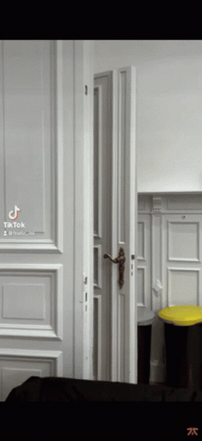 Open Door To Room With Trash Can GIF