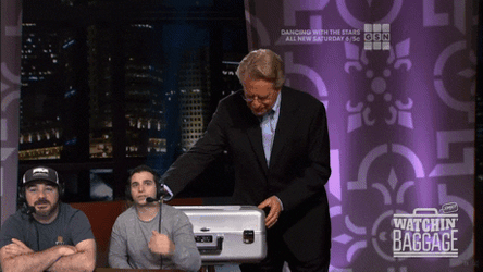 Opening Briefcase Jerry Springer GIF