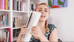 Opening Comic Book With Hannah Witton GIF