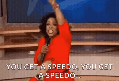 Oprah Winfrey Is Holding A Microphone And Saying You Get A Speedo You Get A Speedo . GIF