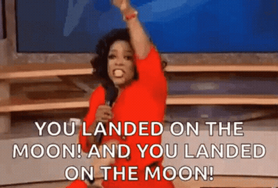 Oprah Winfrey Is Holding A Microphone And Saying `` You Landed On The Moon And You Landed On The Moon '' . GIF