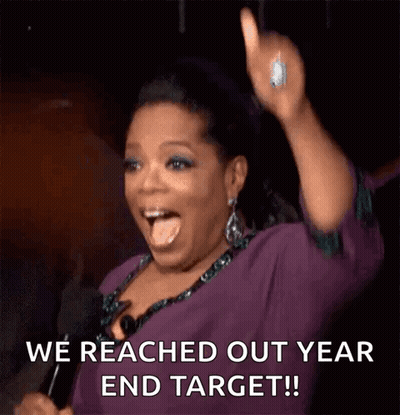 Oprah Winfrey Is Holding A Microphone In Her Hand And Says We Reached Out Year End Target ! GIF