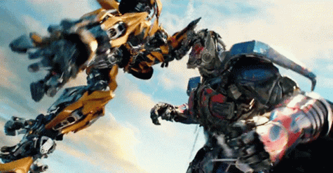 Optimus Prime Fighting Bumblebee GIF