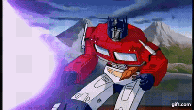 Optimus Prime Flying And Shooting Purple Beam GIF