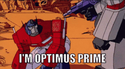 Optimus Prime Kneeling Before Megatron Saying I'm Optimus Prime GIF
