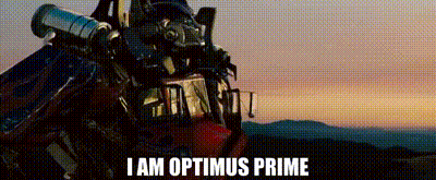 Optimus Prime Standing In Front Of Sunset With Telescope On Head GIF