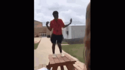 Orange Justice Dance On Top Of Table GIF