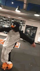 Orange Justice Dance Penguin Costume GIF