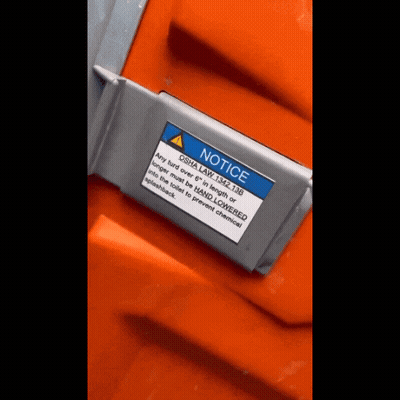 Orange Object With Notice Label GIF