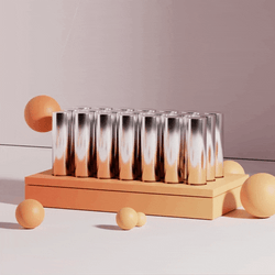 Orange Pendulum Swaying Above Tubes GIF