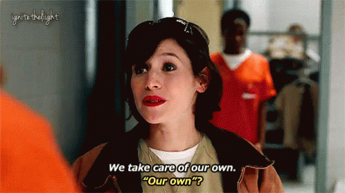 Orange Shirt Woman Says We Take Care GIF