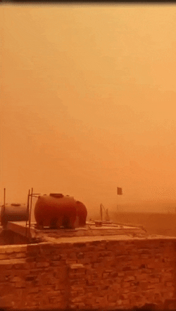 Orange Sky Dust Storm Waving Flag GIF