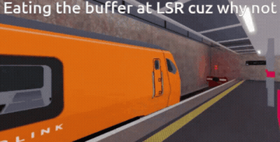 Orange Train Pulling Into Station Eating The Buffer At LSR Cuz Why Not GIF