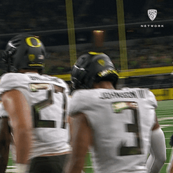 Oregon Ducks Football Team Assisted Jump GIF
