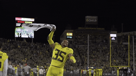 Oregon Football Athlete Twirling Flag GIF