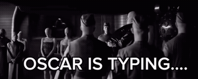 Oscar Is Typing Written On Black And White Image GIF