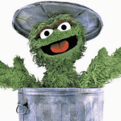 Oscar The Grouch Sticking Tongue Out Of Garbage Can GIF