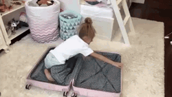 Packing Kid Herself GIF