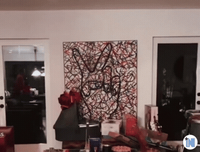 Painting With Letter N On Bottom GIF