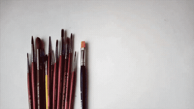 Painting With Pink Yellow And Blue Squares GIF