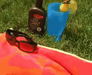 Palmer's Dark Tanning Oil Bottle GIF