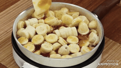 Pan Of Sliced Bananas Being Made In Animotoca GIF