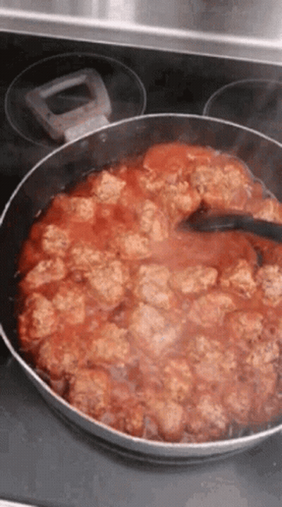 Pan With Meatballs And Tomato Sauce Stirred GIF