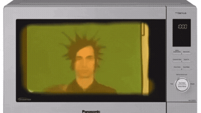 Panasonic Microwave Man In Mohawk GIF