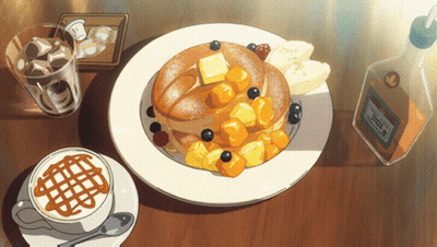 Pancakes With Blueberries And Bananas Next To Coffee And Syrup GIF