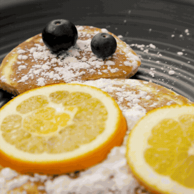 Pancakes With Blueberries And Lemon Slices GIF