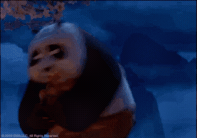 Panda Bear Standing In Front Of Tree With Flowers GIF