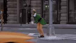 Papa Elf Jumping On Crosswalk GIF