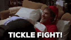 Papa Elf Tickle Fight GIF