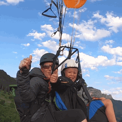 Paragliding Kid With Instructor