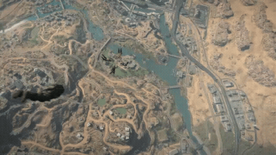 Paratroopers Flying Over City GIF